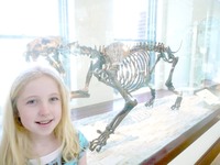 Zoe - Saber-Tooth Fossil & Zoe at LA Cty Museum 2010